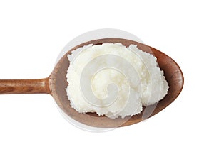 Shea butter in wooden spoon on white, top view