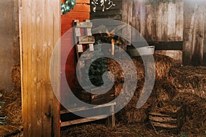 sheaves of hay in a wooden barn. harvesting food dry straw for feeding livestock. rustic country retro scene