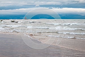 Sheboygan Lighthouse on Lake Michigan Under Cloudy Dark Sky