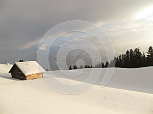 Shed on a snow field