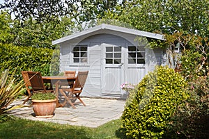 Shed with terrace and garden furniture photo