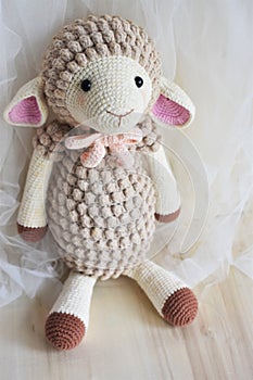 Sheep crochet animal toy for kids lamb crocheting handmade crochet knitting background pastel pink color theme vintage decoration