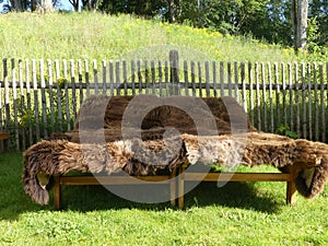 Sheep Whool Flece Blanket on bed outside