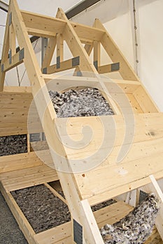 Sheep wool insulation material into wooden wall