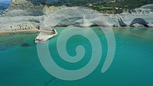 Sheer white cliffs of Cape Drastis near Peroulades