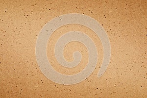 Sheet of brown paper or cardboard texture background