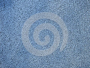 Sheet of cracked safety glass in a window against a blue sky