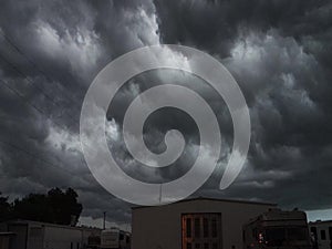 Sheet lightning flashing during a thunderstorm