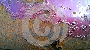 Sheet metal corrosion of old car body. Rusty steel surface, background and damaged texture. Stops and prevents rust concept.