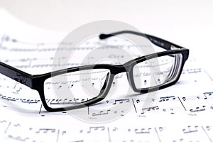 Sheet music and glasses