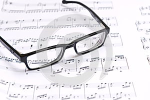 Sheet music and glasses