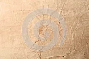 Sheet of old parchment paper as background, top view