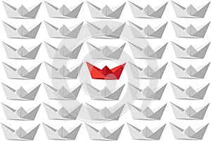 Sheet of paper full of white boats a red one