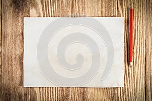 Sheet of paper lying on wooden table