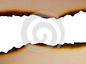 Sheet of paper with the scorched edges close up