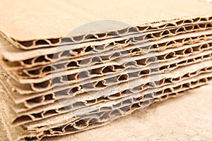 Sheets of brown corrugated cardboard, closeup