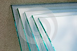 Sheets of Factory manufacturing tempered clear float glass panels cut to size