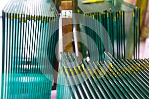 Sheets of Factory manufacturing tempered clear float glass panels cut to size