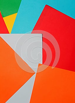 Sheets of multi coloured card/paper abstract background or backdrop