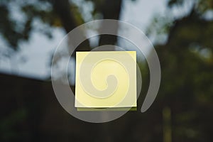 Sheets of note papers, stick notes paper, post it on mirror window