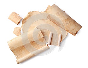 Sheets of old parchment paper on white background, top view