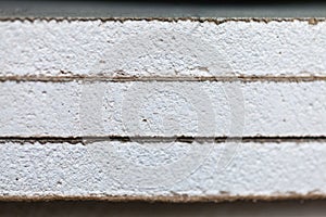 Sheets of plasterboard or drywall close up in an apartment during on the construction, remodeling, rebuilding