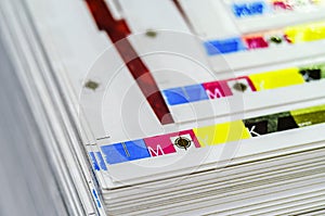 Sheets of printed products. Offset printing. CMYK press. Paper at the printing house