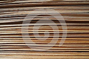 Sheets of stacked plywood in lumberyard.