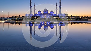 Sheikh Zayed Grand Mosque in Abu Dhabi day to night timelapse after sunset, UAE
