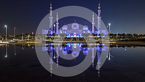 Sheikh Zayed Grand Mosque illuminated at night , Abu Dhabi, UAE.