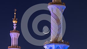 Sheikh Zayed Grand Mosque illuminated at night , Abu Dhabi, UAE.