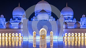 Sheikh Zayed Grand Mosque illuminated at night , Abu Dhabi, UAE.