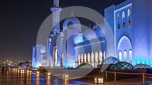 Sheikh Zayed Grand Mosque illuminated at night timelapse, Abu Dhabi, UAE.