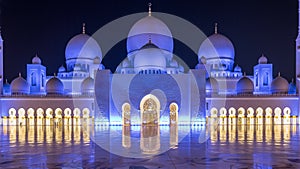 Sheikh Zayed Grand Mosque illuminated at night timelapse, Abu Dhabi, UAE.