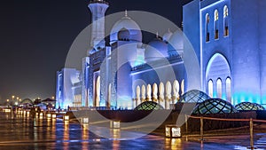 Sheikh Zayed Grand Mosque illuminated at night timelapse, Abu Dhabi, UAE.