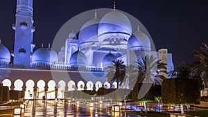 Sheikh Zayed Grand Mosque illuminated at night timelapse, Abu Dhabi, UAE.