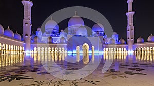 Sheikh Zayed Grand Mosque illuminated at night timelapse hyperlapse, Abu Dhabi, UAE.