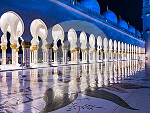 The Sheikh Zayed Grand Mosque at night, in Abu Dhabi, United Arab Emirates