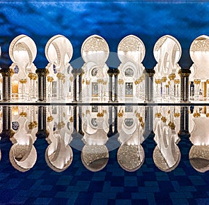 The Sheikh Zayed Grand Mosque at night, in Abu Dhabi, United Arab Emirates