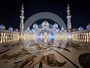 The Sheikh Zayed Grand Mosque at night, in Abu Dhabi, United Arab Emirates