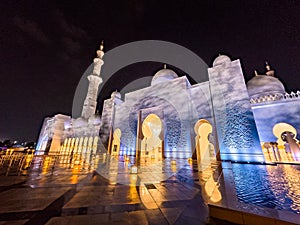 The Sheikh Zayed Grand Mosque at night, in Abu Dhabi, United Arab Emirates