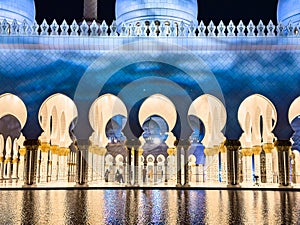 The Sheikh Zayed Grand Mosque at night, in Abu Dhabi, United Arab Emirates