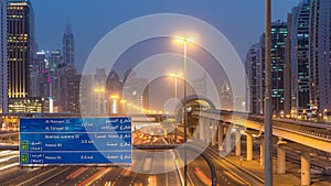 Sheikh Zayed road traffic day to night timelapse and Dubai Metro. Dubai, UAE.