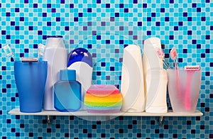 Shelf in the bathroom with toothbrush and other hygiene products