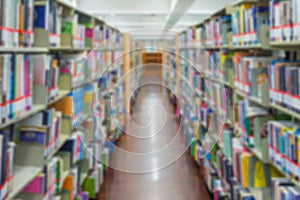 shelf with books in the library background. the image was blurred for use as a background. photo