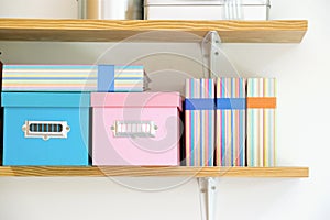 Shelf with boxes and file