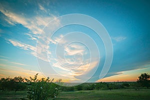 Shelf cloud spans over Texan landscape at sunset