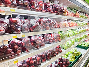 Shelf with Fresh fruits and vegetable in supermarket Healthy food concept.