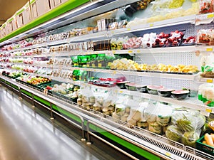 Shelf with Fresh fruits and vegetable in supermarket Healthy food concept