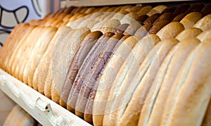 Shelf with fresh white bread
